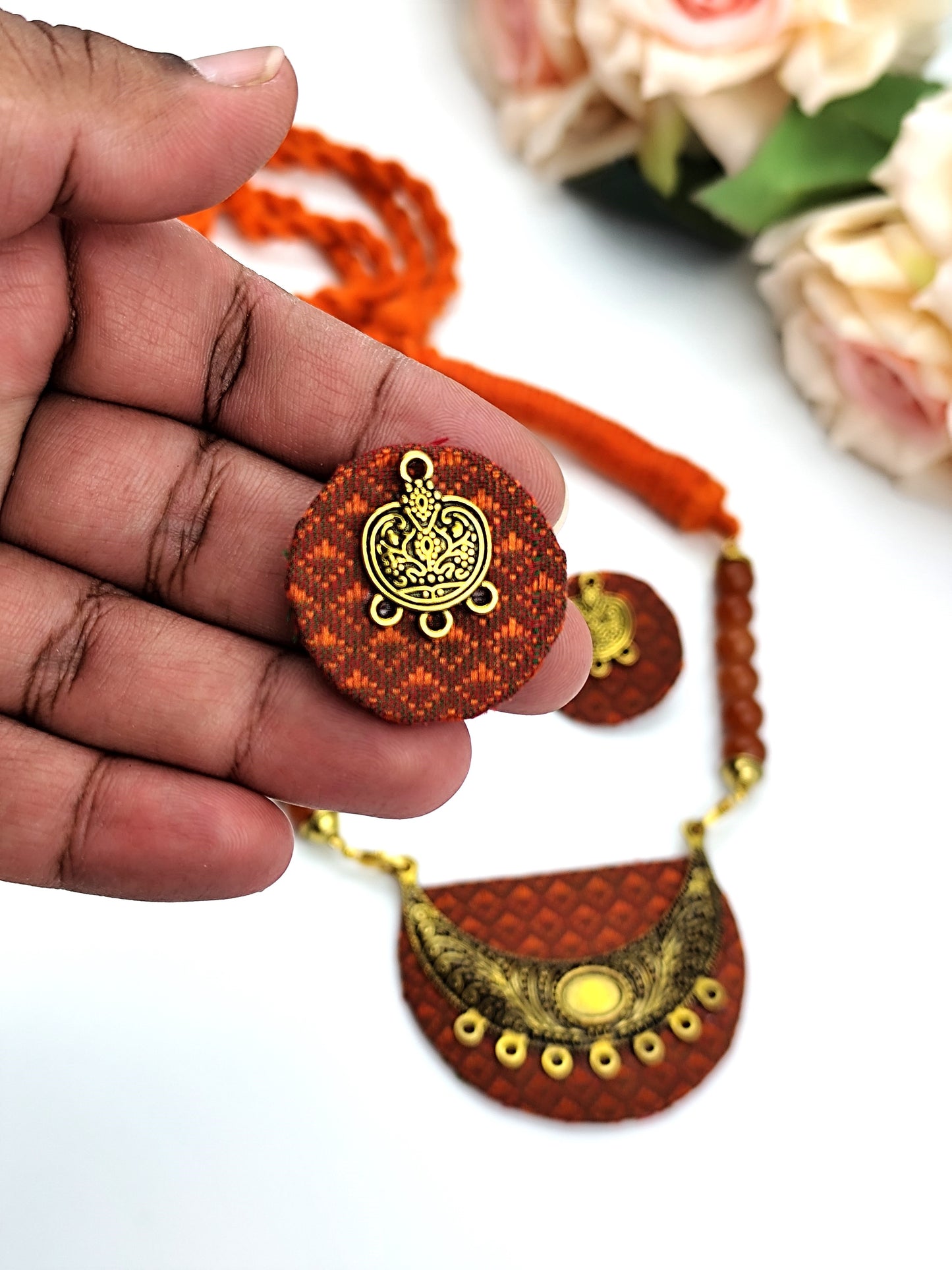 Khaan Fabric Orange Set with Golden Charms