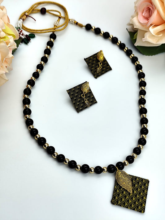 Khaan Fabric Black & Yellow Set with Golden Charms