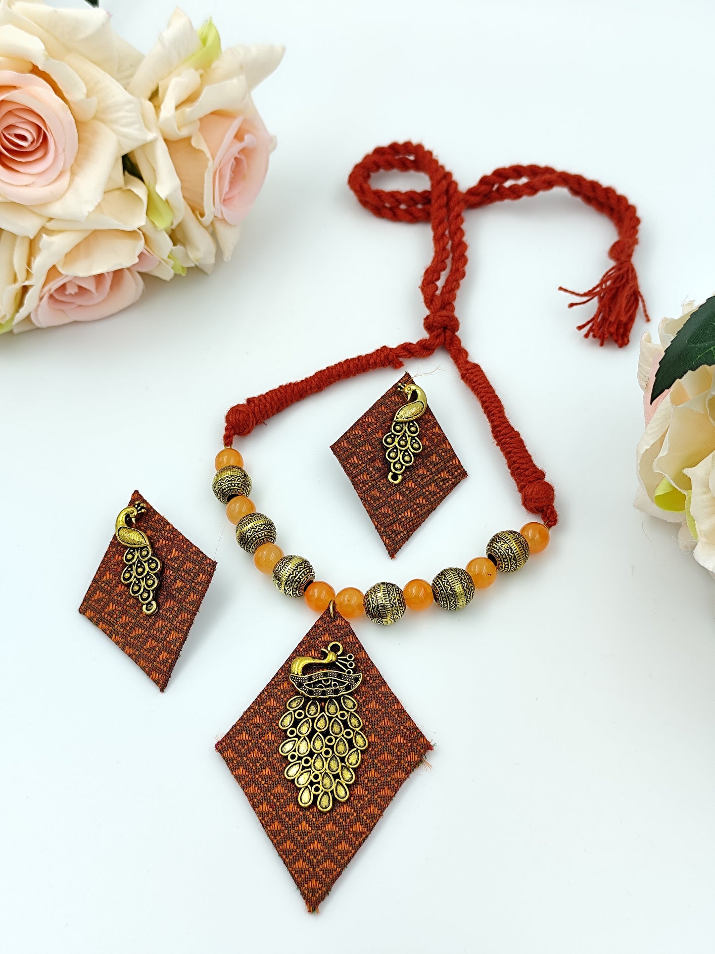 Khaan Fabric Set - Orange & Brown With Antique Golden Peacock Charm & Earrings