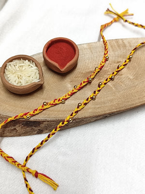 Braided Rakhi with Golden Beads Bhai Rakhi