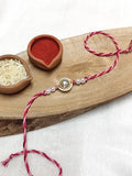 White Kundan & Pearl with Pink Threads Bhai Rakhi