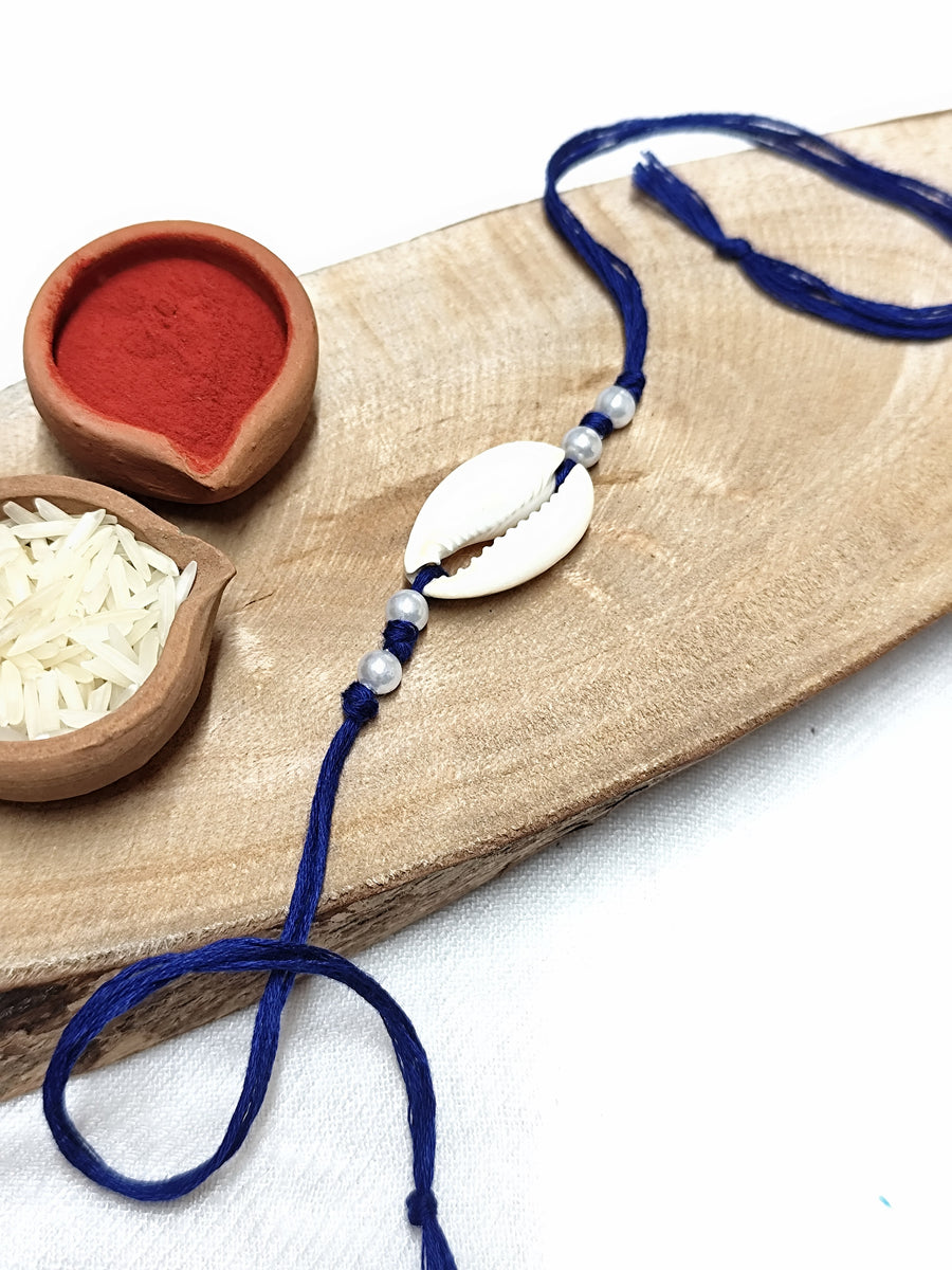 Chowrie Shell & Pearl with colour threads Bhai Rakhi