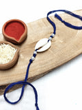 Chowrie Shell & Pearl with colour threads Bhai Rakhi