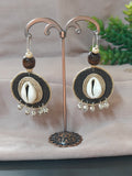 Round Black & Off-white Earrings with Coweri and Ghungroo Details